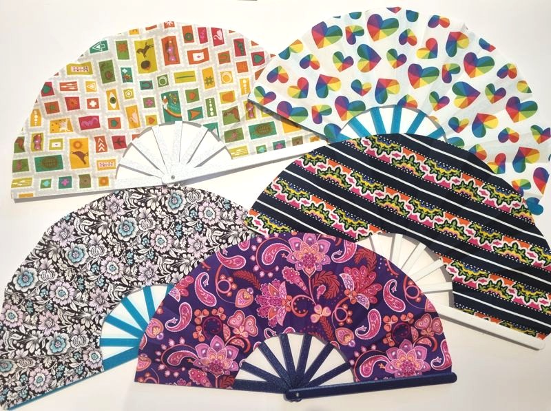 A selection of fabric fans of various colours and patterns